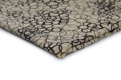 tkanina szyfon drukowany beż w czarne przecinające sie okręgi